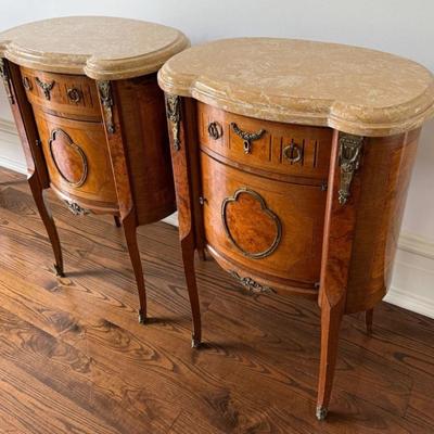 Sale Photo Thumbnail #56: Pair of Antique Marble Top Ormolu French Louis XV Nightstands or Accent Tables  23.5" x 16" x 34"
“Antique condition with some marks and dings in the wood. One area on the front looks like maybe it was repaired.