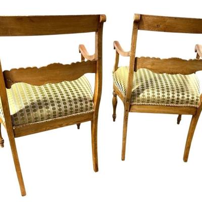 Sale Photo Thumbnail #93: Pair of Antique Armchairs Carved Wood with fairly new Green Polka Dot Upholstery.
These chairs are antique - they have splitting in the wood seams, nicks, scuffs and fading of the wood stain. One of the chairs has a portion of the back glued together. Fab