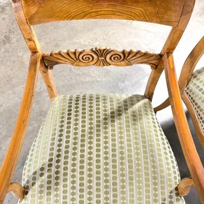 Sale Photo Thumbnail #94: Pair of Antique Armchairs Carved Wood with fairly new Green Polka Dot Upholstery.
These chairs are antique - they have splitting in the wood seams, nicks, scuffs and fading of the wood stain. One of the chairs has a portion of the back glued together. Fab