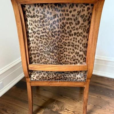 Sale Photo Thumbnail #101: Antique Empire Style Leopard Print Animal Hide Carved Wood Arm Chair 21" x 20.5" x 36.5"
“Light scuff marks on wood. Some surface rubbing on leopard print on seat.”