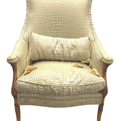 Sale Photo Thumbnail #113: Antique Accent Arm Chair w Carved Wood Details. Updated in a Contemporary Shiny Crocodile Print Pattern Upholstery with Tasseled Lumbar Pillow. “In great re-upholstered condition. Wood has minor marks.”
Approximate Size: 27" x 24" x 39"
Arm Height 26"