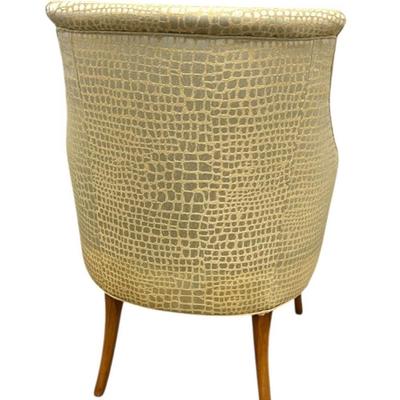 Sale Photo Thumbnail #114: Antique Accent Arm Chair w Carved Wood Details. Updated in a Contemporary Shiny Crocodile Print Pattern Upholstery with Tasseled Lumbar Pillow. “In great re-upholstered condition. Wood has minor marks.”
Approximate Size: 27" x 24" x 39"
Arm Height 26"