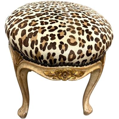 Sale Photo Thumbnail #117: Antique French Louis XVI Leopard Print Animal Hide Seat with metal studs and carved flower Ottoman Foot Stool Seat
Approximate Size: 17.5" x 14" x 15"
“In great condition with some rubbing in the animal hide seat on top. Some scuff marks in the paint al