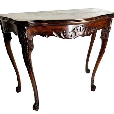 Sale Photo Thumbnail #154: Vintage Mahogany Wood Parlor Tea Table 14" x 26" x 21"
In great condition with small marks allover and one larger one on the top. Some "splitting at the seams" which I think is just part of production and not a flaw.