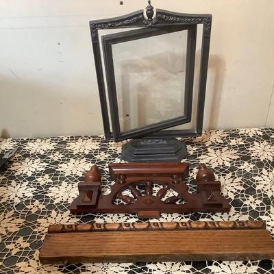 Sale Photo Thumbnail #129: Wood picture frame that spins, two wood toppers.  One has spindles and could have been to a clock the other is wood trim.