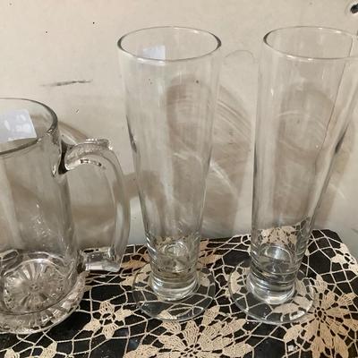 Sale Photo Thumbnail #280: Two glass beer mugs, 2 Pilsner beer glasses, 2 beveled square beer mugs.