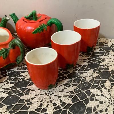Sale Photo Thumbnail #327: Two smaller tea pots, two smaller pitcher, two larger glass one smaller glass three shakers, and salt and peppers