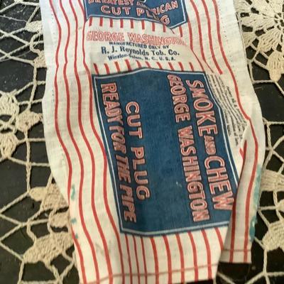 Sale Photo Thumbnail #15: Bag full of George Washington tobacco plugs cloth labels.