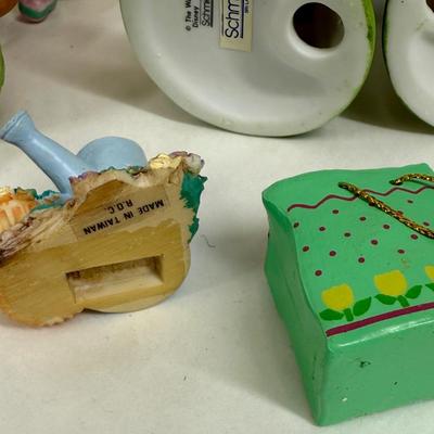 Sale Photo Thumbnail #460: Set of Disney Easter figurines. The figurines are Mickey Mouse, Minnie Mouse, Donald Duck, Daisy Duck, and Pluto