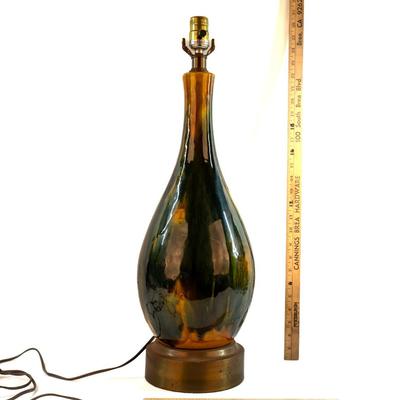 Sale Photo Thumbnail #26: Mid-Century Modern, often associated with the "Etruscan" style. Features a drip or "lava" glaze in shades of green, yellow, and brown. Tested, works as expected, designed for use with a 3-way bulb.