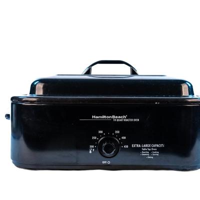 Sale Photo Thumbnail #57: It bakes, roast, slow cooks, steams, and keeps food warm. The temperatures are adjustable. The removable pan makes it easy for cleanup. It is large enough to cook a substantial turkey.