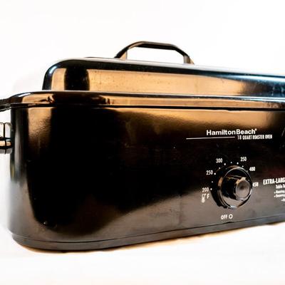 Sale Photo Thumbnail #66: It bakes, roast, slow cooks, steams, and keeps food warm. The temperatures are adjustable. The removable pan makes it easy for cleanup. It is large enough to cook a substantial turkey.