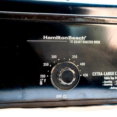 Sale Photo Thumbnail #65: It bakes, roast, slow cooks, steams, and keeps food warm. The temperatures are adjustable. The removable pan makes it easy for cleanup. It is large enough to cook a substantial turkey.