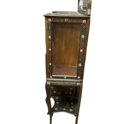 Sale Photo Thumbnail #400: Antique Hand-Painted French Victorian Style Cabinet W/ Glass Doors & Mirror
• Features intricate hand-painted designs and floral motifs
• Includes beveled mirror and glass-paneled doors
• Sturdy wood construction for durability
• Ample storage wit