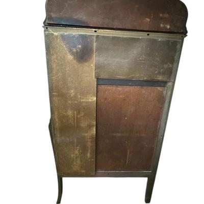 Sale Photo Thumbnail #396: Antique Hand-Painted French Victorian Style Cabinet W/ Glass Doors & Mirror
• Features intricate hand-painted designs and floral motifs
• Includes beveled mirror and glass-paneled doors
• Sturdy wood construction for durability
• Ample storage wit