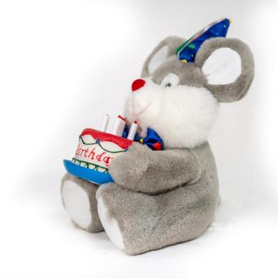 Sale Photo Thumbnail #177: Stuffed mouse with grey and white fur, large ears, and a red nose. Its wearing a colorful party hat and bow.