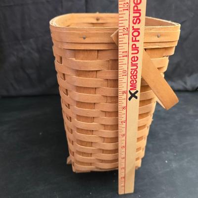 Longaberger footed magazine basket dated 1989 and signed by its weaver with wooden Pumpkin -