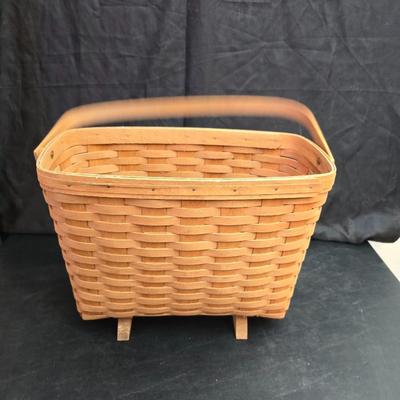 Longaberger footed magazine basket dated 1989 and signed by its weaver with wooden Pumpkin -