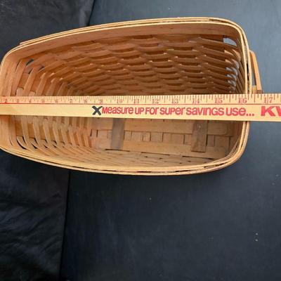 Longaberger footed magazine basket dated 1989 and signed by its weaver with wooden Pumpkin -