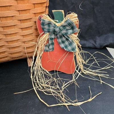Longaberger footed magazine basket dated 1989 and signed by its weaver with wooden Pumpkin -