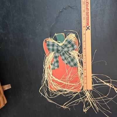 Longaberger footed magazine basket dated 1989 and signed by its weaver with wooden Pumpkin -