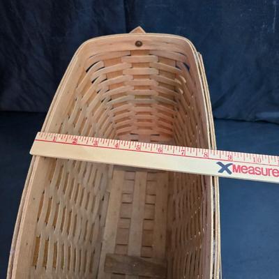 Longaberger footed magazine basket dated 1989 and signed by its weaver with wooden Pumpkin -