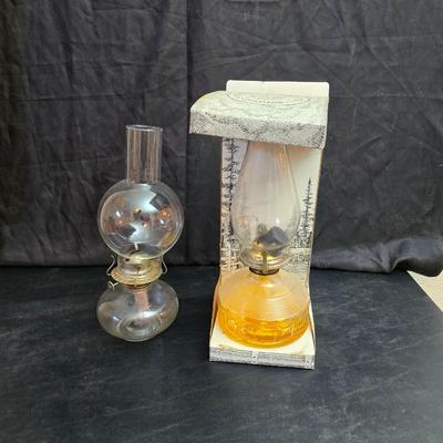 Two glass chamber-style oil lamps -Lamplight Farms.