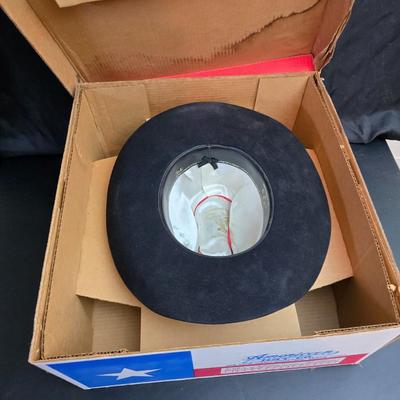 Black felt American Hat Company cowboy hat with a braided hatband with white tassels, with its original box. Size 7 1/4 comes with a hat...