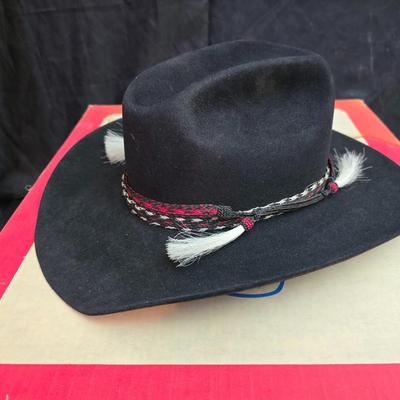 Black felt American Hat Company cowboy hat with a braided hatband with white tassels, with its original box. Size 7 1/4 comes with a hat...
