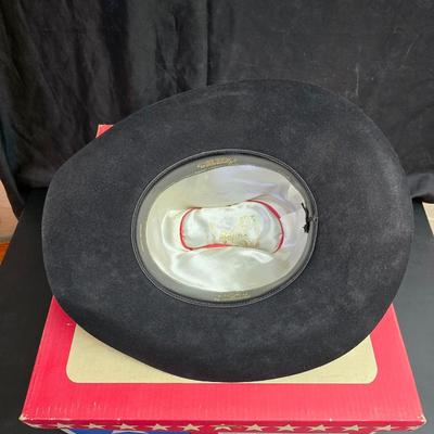 Black felt American Hat Company cowboy hat with a braided hatband with white tassels, with its original box. Size 7 1/4 comes with a hat...