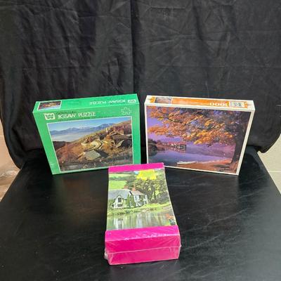 Three brand new never opened puzzles - sealed boxes - Jigsaw puzzles