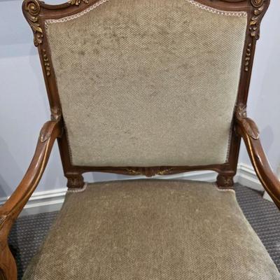 Sale Photo Thumbnail #48: Beautifully upholstered French carved Louis XV style accent chairs. Both chairs are immaculate. The touch of gold on the ornate carved wood with the natural earthy color upholstery is classic. 
You are bidding on the pair here, meaning you must pay for an