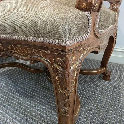 Sale Photo Thumbnail #50: Beautifully upholstered French carved Louis XV style accent chairs. Both chairs are immaculate. The touch of gold on the ornate carved wood with the natural earthy color upholstery is classic. 
You are bidding on the pair here, meaning you must pay for an