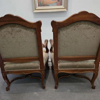 Sale Photo Thumbnail #51: Beautifully upholstered French carved Louis XV style accent chairs. Both chairs are immaculate. The touch of gold on the ornate carved wood with the natural earthy color upholstery is classic. 
You are bidding on the pair here, meaning you must pay for an