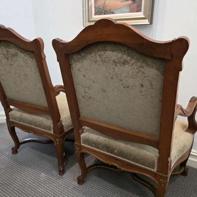 Sale Photo Thumbnail #52: Beautifully upholstered French carved Louis XV style accent chairs. Both chairs are immaculate. The touch of gold on the ornate carved wood with the natural earthy color upholstery is classic. 
You are bidding on the pair here, meaning you must pay for an