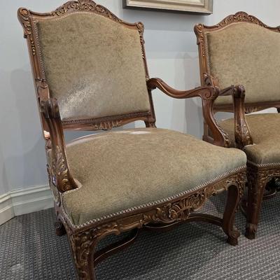 Sale Photo Thumbnail #47: Beautifully upholstered French carved Louis XV style accent chairs. Both chairs are immaculate. The touch of gold on the ornate carved wood with the natural earthy color upholstery is classic. 
You are bidding on the pair here, meaning you must pay for an