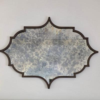 Sale Photo Thumbnail #54: Lovely vintage style mirror with all the right curves to add a touch of charm to any space. It measures 57"L x 42"H. 
You are only bidding on the mirror. Any furniture or other items in pictures are NOT included. Pictures taken with other items present ar