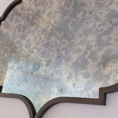 Sale Photo Thumbnail #55: Lovely vintage style mirror with all the right curves to add a touch of charm to any space. It measures 57"L x 42"H. 
You are only bidding on the mirror. Any furniture or other items in pictures are NOT included. Pictures taken with other items present ar