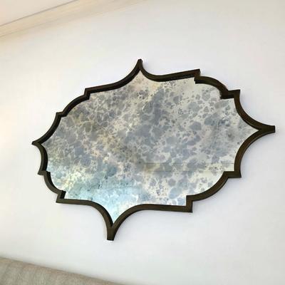 Sale Photo Thumbnail #53: Lovely vintage style mirror with all the right curves to add a touch of charm to any space. It measures 57"L x 42"H. 
You are only bidding on the mirror. Any furniture or other items in pictures are NOT included. Pictures taken with other items present ar