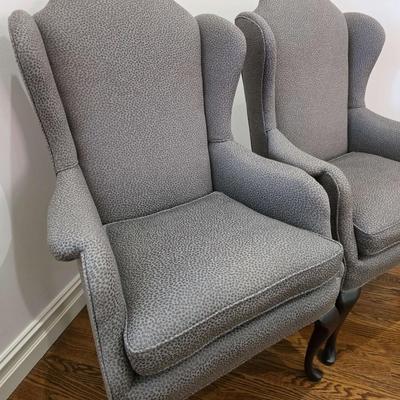 Sale Photo Thumbnail #60: Classic pair of custom upholstered armchairs with a modern twist. The gray textured upholstery feels and looks great with almost any decor. The chairs measure 27"W x 20"D x 42"H. Both are in excellent condition. You are bidding on the pair here meaning yo