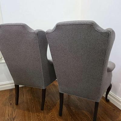 Sale Photo Thumbnail #65: Classic pair of custom upholstered armchairs with a modern twist. The gray textured upholstery feels and looks great with almost any decor. The chairs measure 27"W x 20"D x 42"H. Both are in excellent condition. You are bidding on the pair here meaning yo