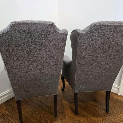 Sale Photo Thumbnail #64: Classic pair of custom upholstered armchairs with a modern twist. The gray textured upholstery feels and looks great with almost any decor. The chairs measure 27"W x 20"D x 42"H. Both are in excellent condition. You are bidding on the pair here meaning yo