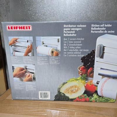 Large assortment of Kitchen must haves - bags - paper plates - plastic flatware and a Leifheit kitchen roll holder