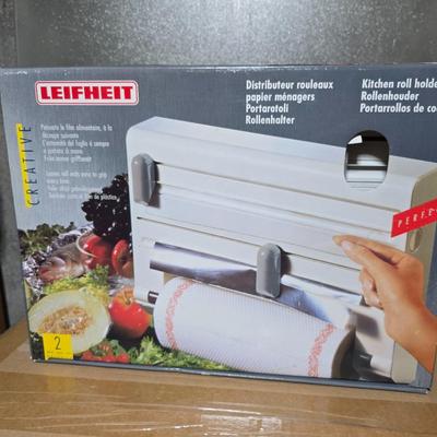 Large assortment of Kitchen must haves - bags - paper plates - plastic flatware and a Leifheit kitchen roll holder