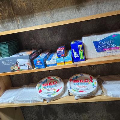 Large assortment of Kitchen must haves - bags - paper plates - plastic flatware and a Leifheit kitchen roll holder