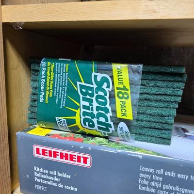 Large assortment of Kitchen must haves - bags - paper plates - plastic flatware and a Leifheit kitchen roll holder