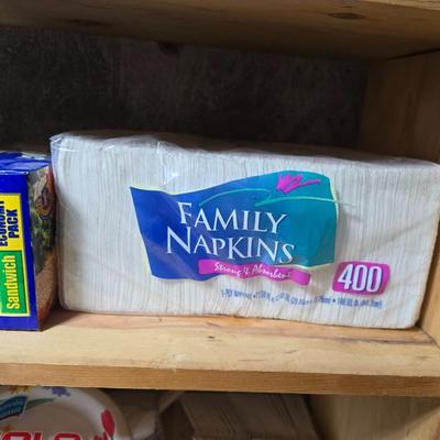 Large assortment of Kitchen must haves - bags - paper plates - plastic flatware and a Leifheit kitchen roll holder