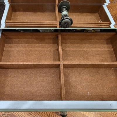 Sale Photo Thumbnail #72: This gorgeous, mirrored jewelry armoire will make a perfect gift for the holidays! The top lifts, the sides open and it has 7 drawers of varying sizes to accommodate all kinds of treasured jewels. This piece is in great condition and measures 32"H x 18"W 