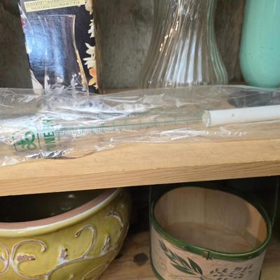 Large assortment of mostly ceramic garden pots, vases, with a new rain gauge and new Russco iii wind chime