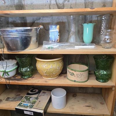 Large assortment of mostly ceramic garden pots, vases, with a new rain gauge and new Russco iii wind chime